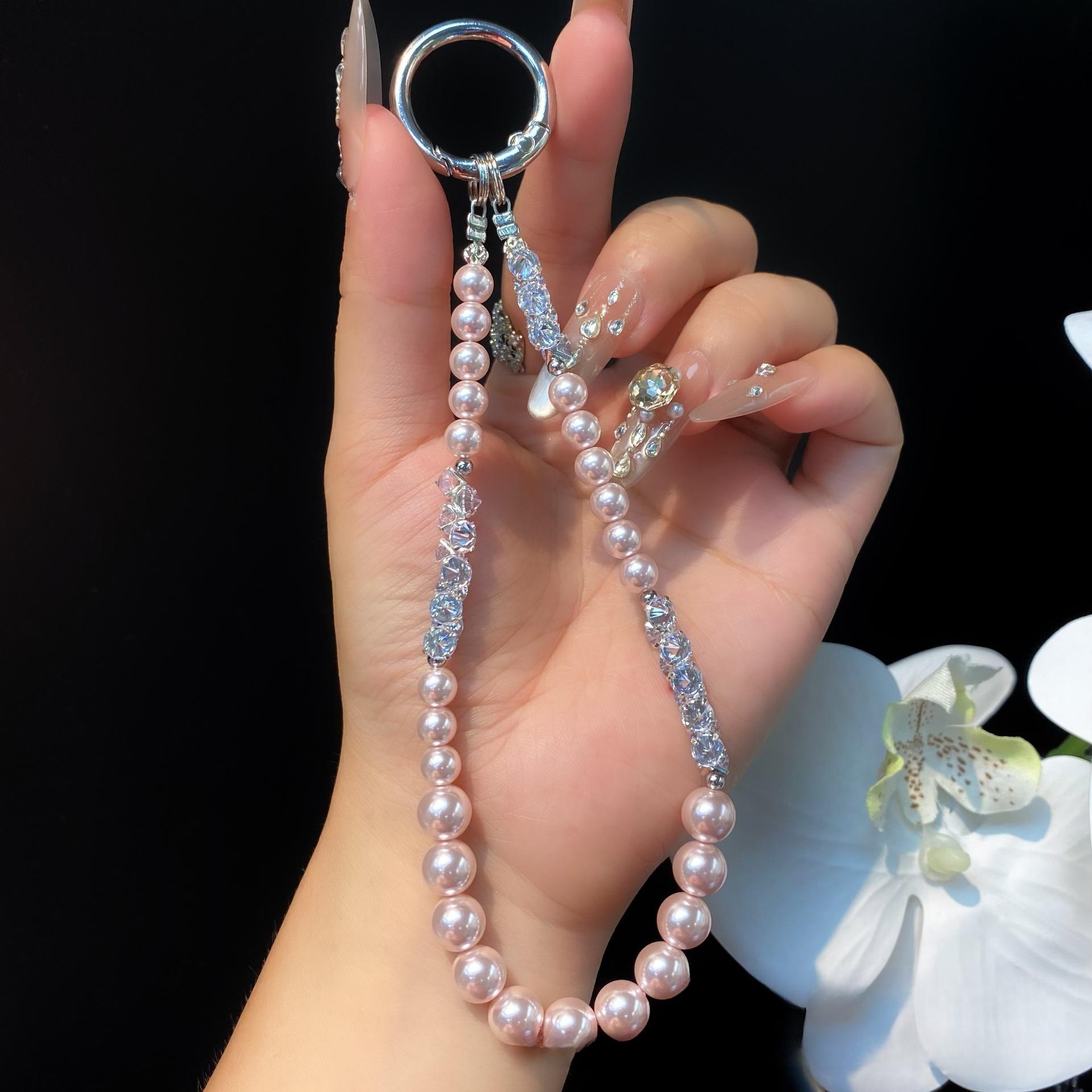 

Exquisite High-End Feel Phone Chain Dahua Pearl Rhinestone Elegant Wrist Hanging Chain Niche Beaded Chain Pendant Wholesale