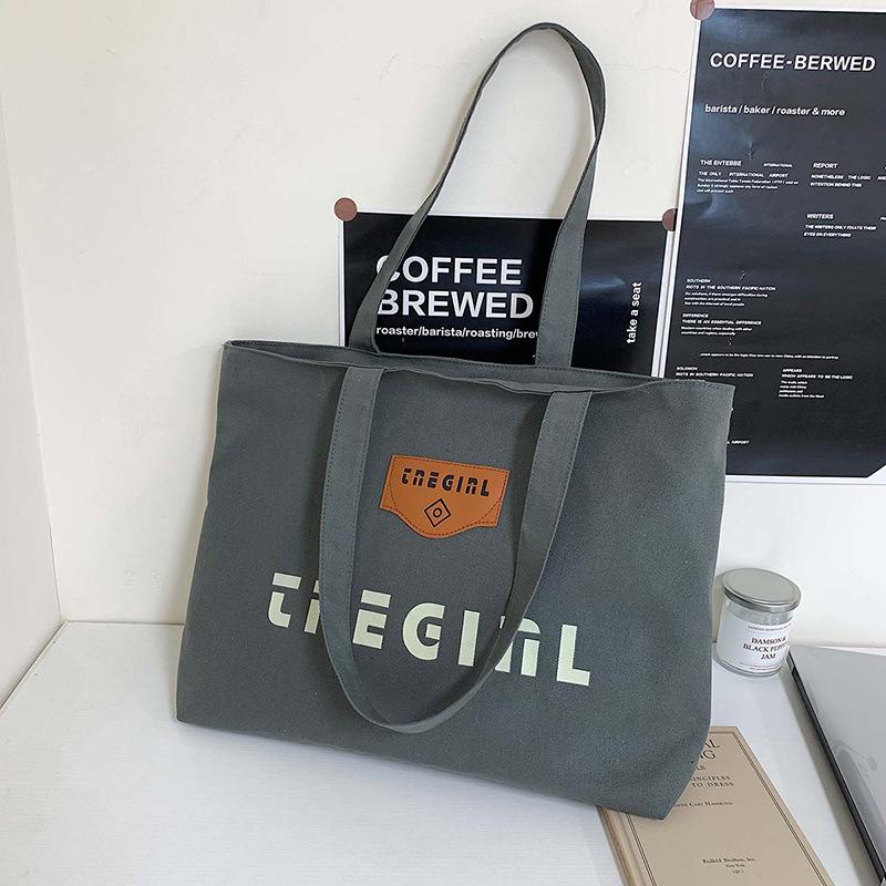 

Large-capacity canvas bag women s autumn and winter versatile 2025 new leisure shoulder college students commuting tote bag зелёный
