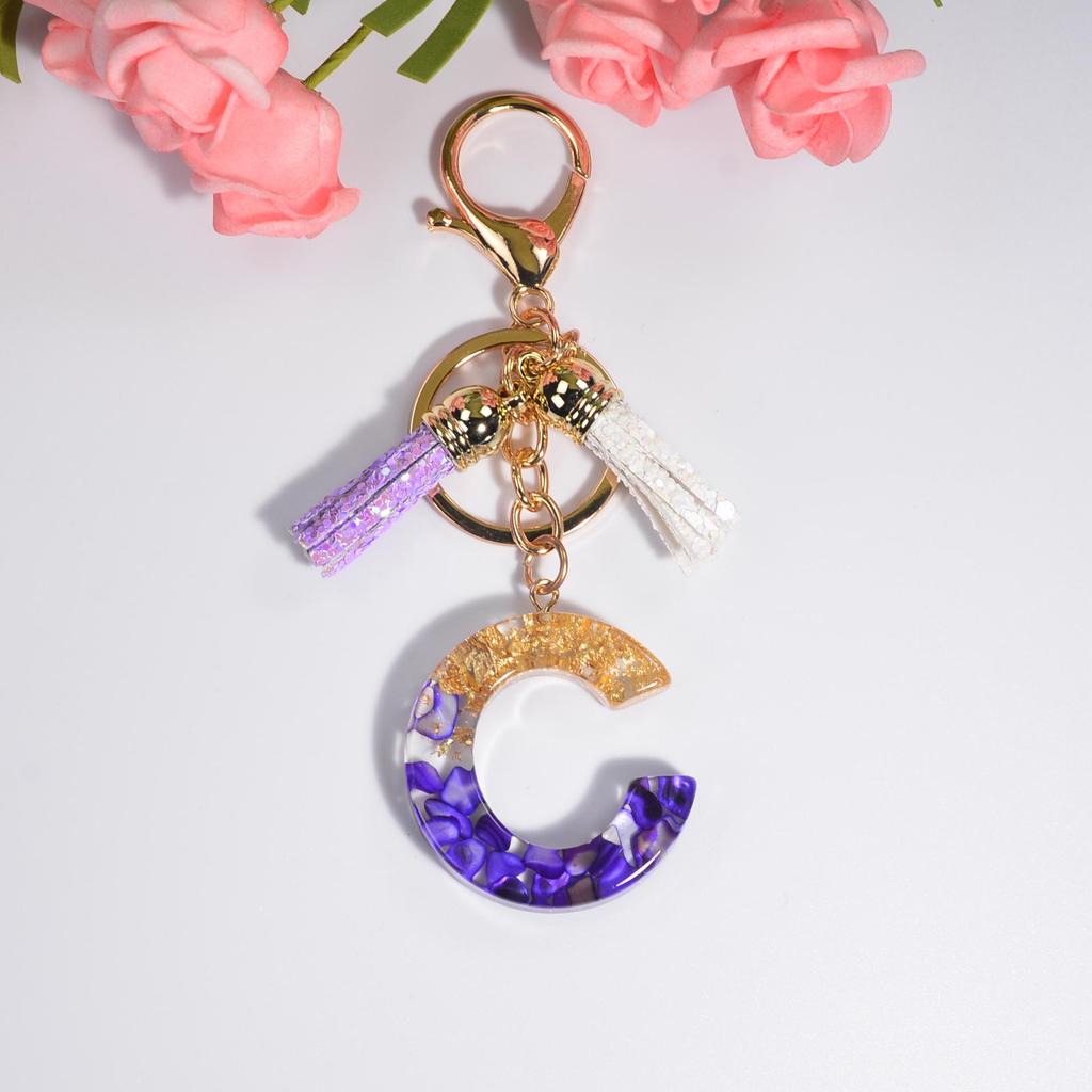 Lila Kristall Epoxid Buchstaben Schlüsselanhänger mit Quaste - Harzschmuck Anhänger Charm