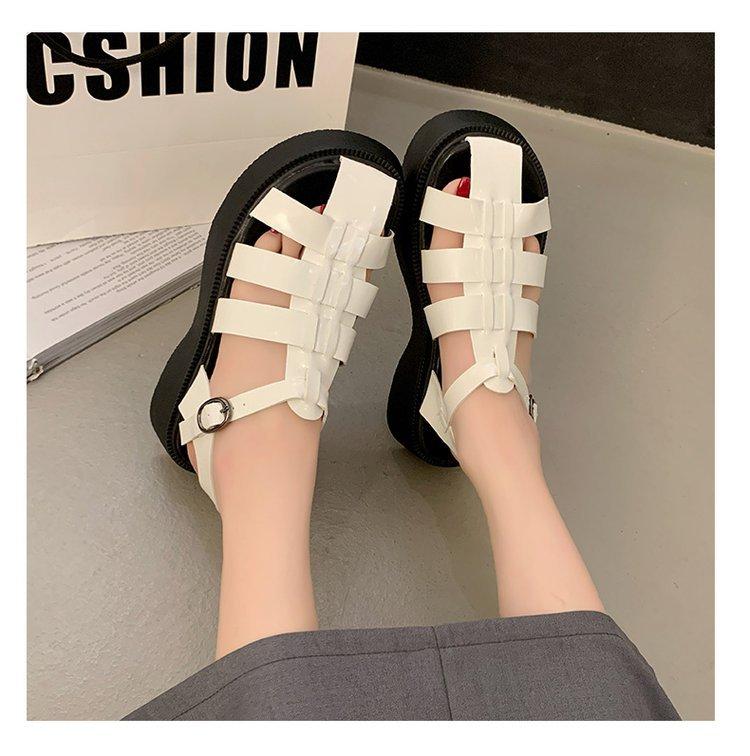 Roman bag head sandals women's outer wear spring 2025 new British style casual muffin thick-soled Roman pig cage shoes