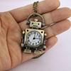 Ceas de buzunar cu pandantiv, cu cuarț, cu cadran rotund cu cifre arabe, în formă de robot vintage, decorat cu un breloc drăguț pentru geantă, pentru o petrecere