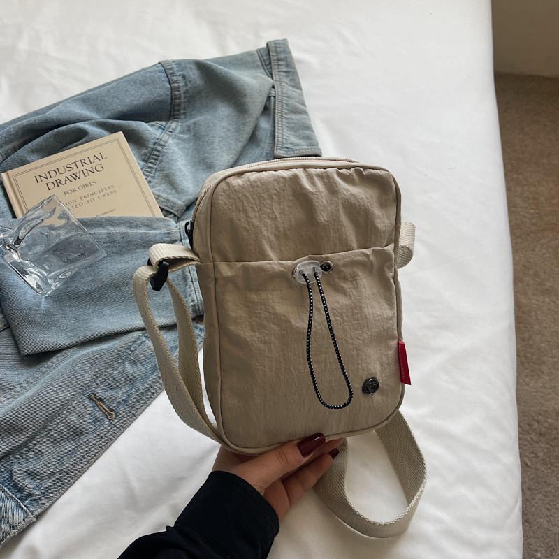 Mini Crossbody Bag For Women With Nylon Material And Zipper Closure For Daily Use