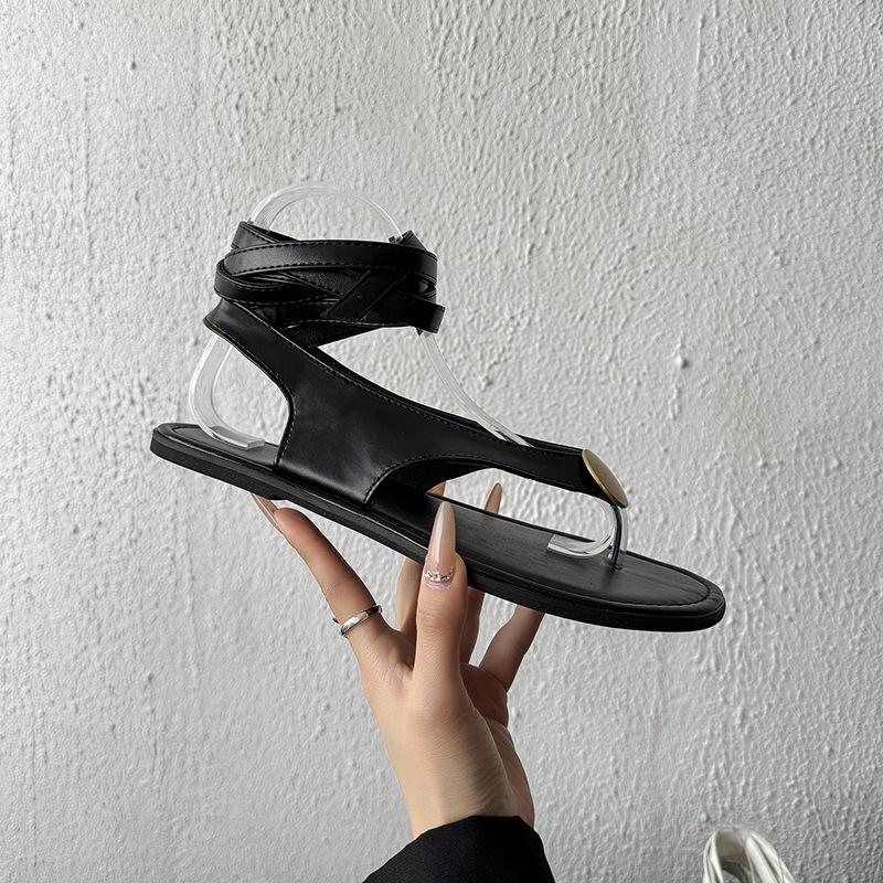 

Нишевые 2025 новые внешнеторговые сандалии на плоской подошве с ремешками, вьетнамки, универсальные повседневные римские пляжные туфли в стиле отпуска 35 чёрный