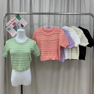Lente en Zomer Ontwerpgevoel Uitgesneden Buitenlandse Gasbel Mouw Kort Gebreid Shirt Dunne Veelzijdige Ronde Hals Tops Dames Casual Pullovers T-shirts