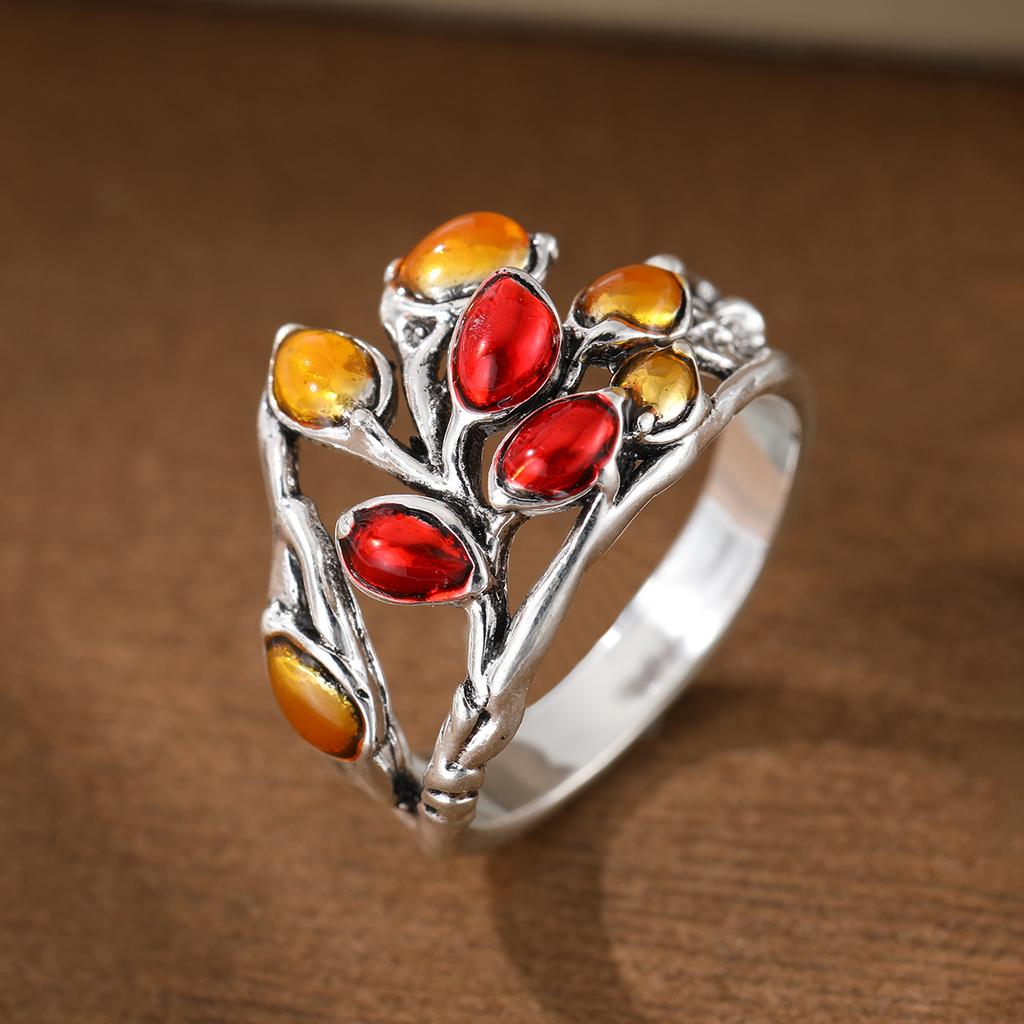 A retro inlaid two-color artificial gemstone ring made of copper, suitable for both daily wear and date occasions.