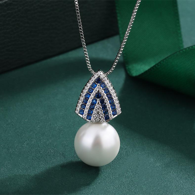 

Ожерелье из настоящего золота с медным покрытием, серьги-гвоздики, женский комплект украшений с микроинкрустацией из голубых бриллиантов и цирконов, подвеской из белого жемчуга