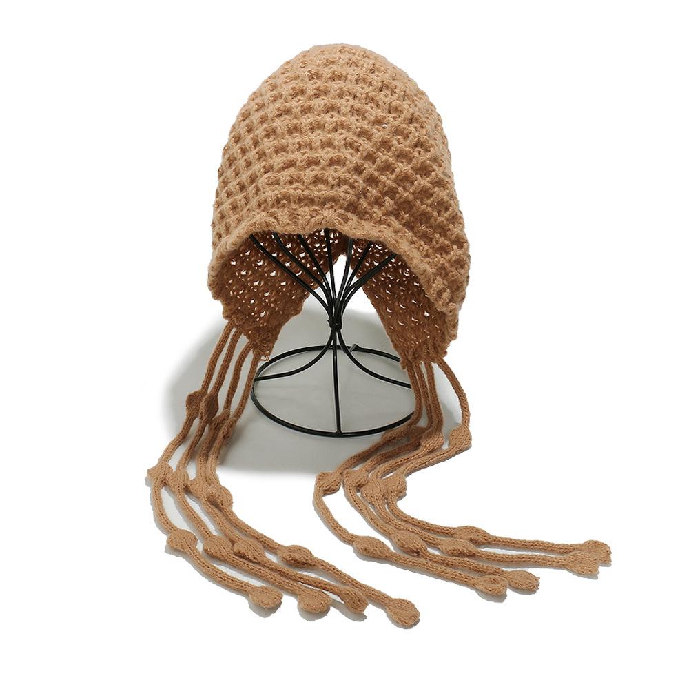 Autumn and winter warm wool hat, hand-woven hollow bag head hat, women's ethnic style fringed ear protector, knitted hat, women