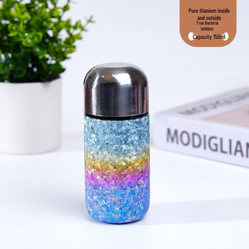 > Sleek Mini Titanium Antibacterial Double-Layer Thermos Cup - Portable, High-Value, Pocket-Sized.