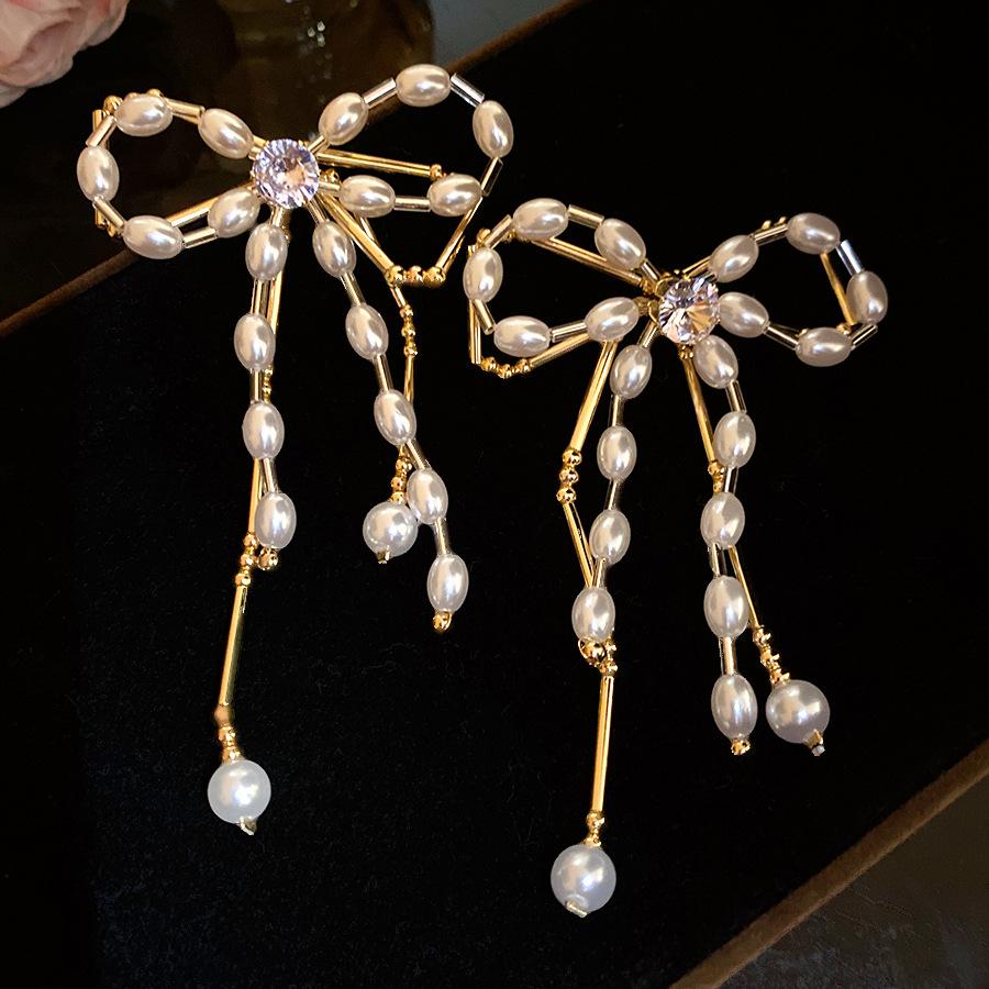 Silver needle zircon pearl beaded bow fringed earrings European and American retro fashion stud earrings light luxury high-end earrings