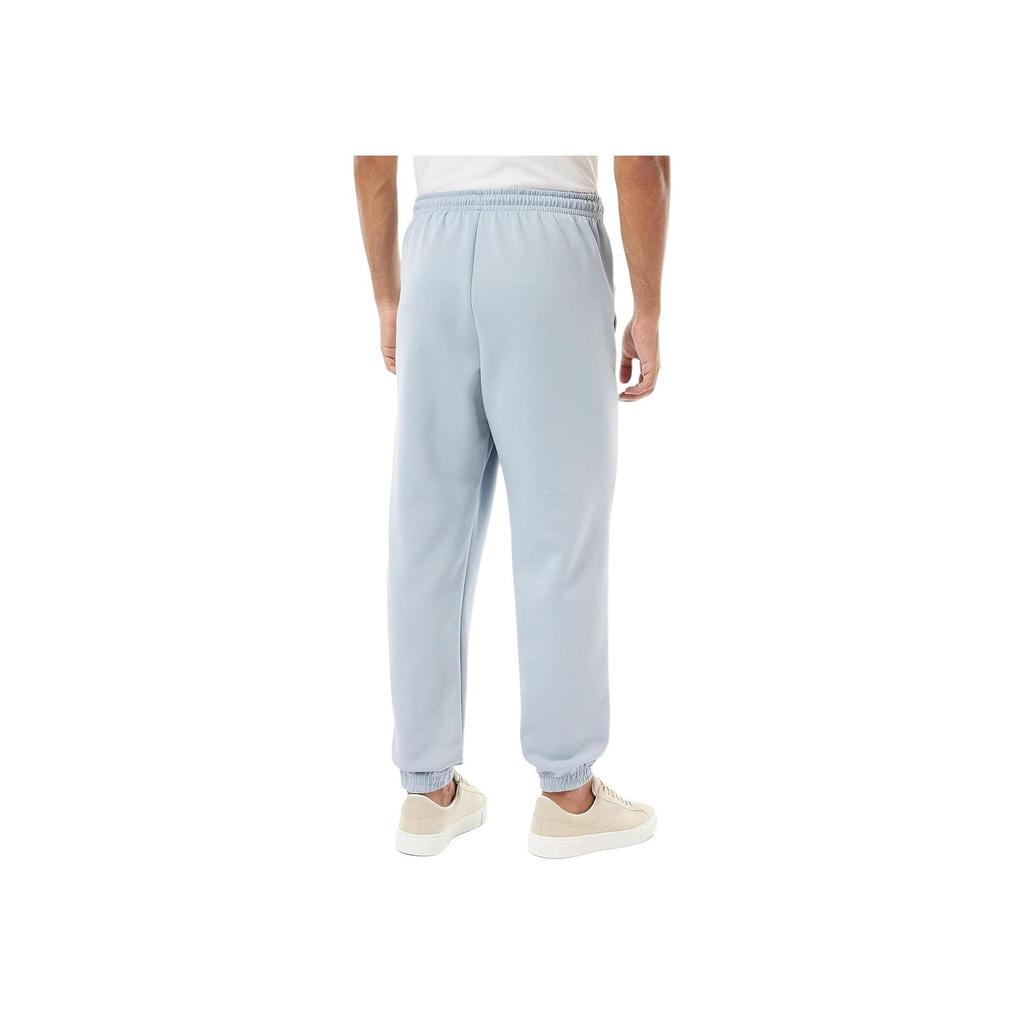 Under Armour Solid Color Cuffed Joggers Men Bottoms Blue 1377175-465