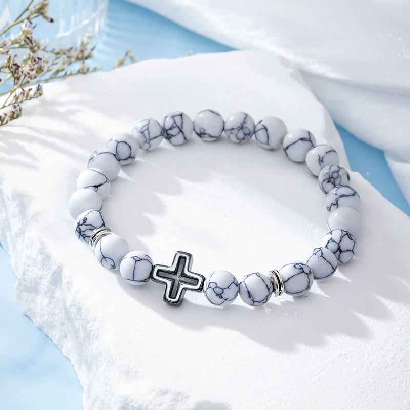 

Мода Религия Крест Мужчины Женщины 8 мм Натуральный камень Тигровый глаз Вулканический камень Бисер Браслет Эластичный браслет Ювелирные изделия