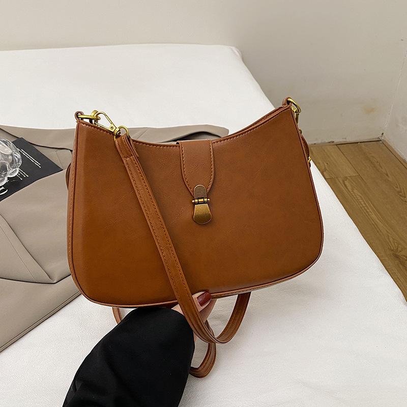 

French style is popular this year, underarm bag 2025 winter new niche design, personalized fashion commuter shoulder crescent bag коричневый