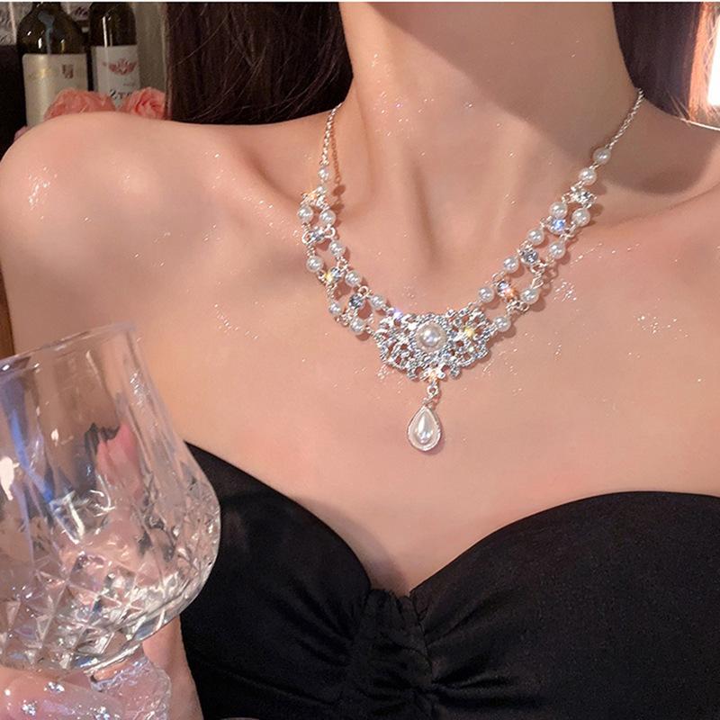 Collier Guochao avec serrure de sécurité sertie de diamants et perle en forme de goutte d'eau chaîne de clavicule personnalité de niche collier exagéré tempérament femme