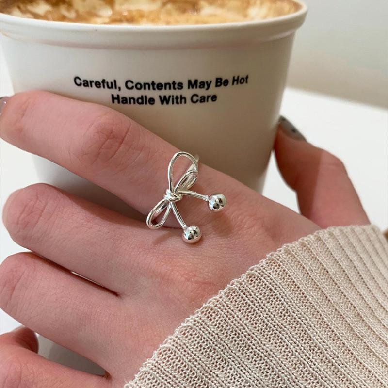 Elegant Adjustable Copper Butterfly Knot Ring For Women With Chic Minimalist Geometric Design