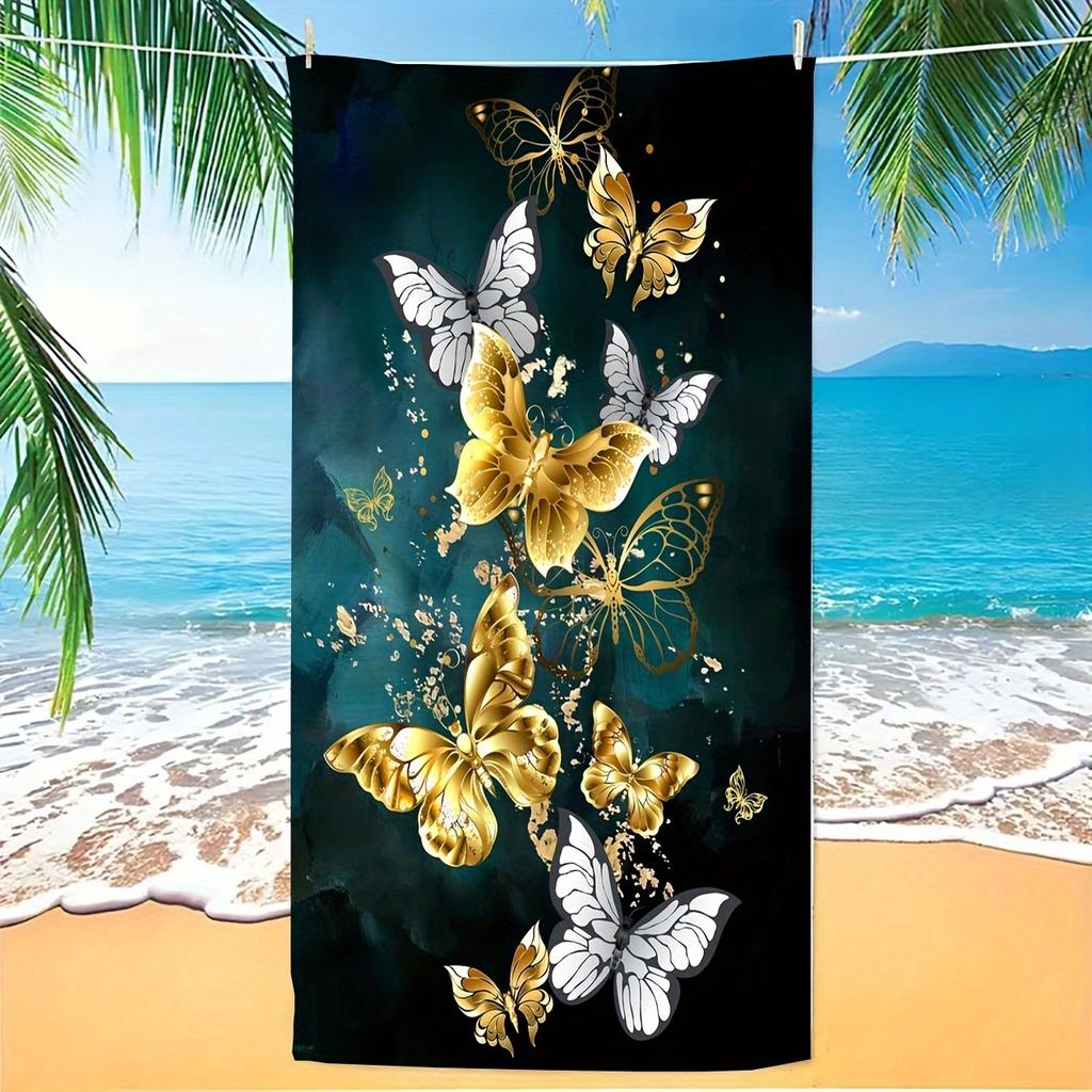 A women's oversized beach towel that is soft quick-drying and super absorbent with a beautiful butterfly and flower design