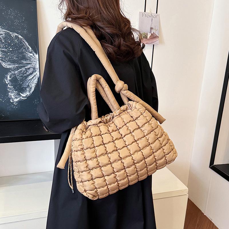 

Bags Women s commuter large-capacity dual-purpose portable tote bag 2025 autumn and winter embroidery thread bubble fashion trend 38*9*28*15 хаки