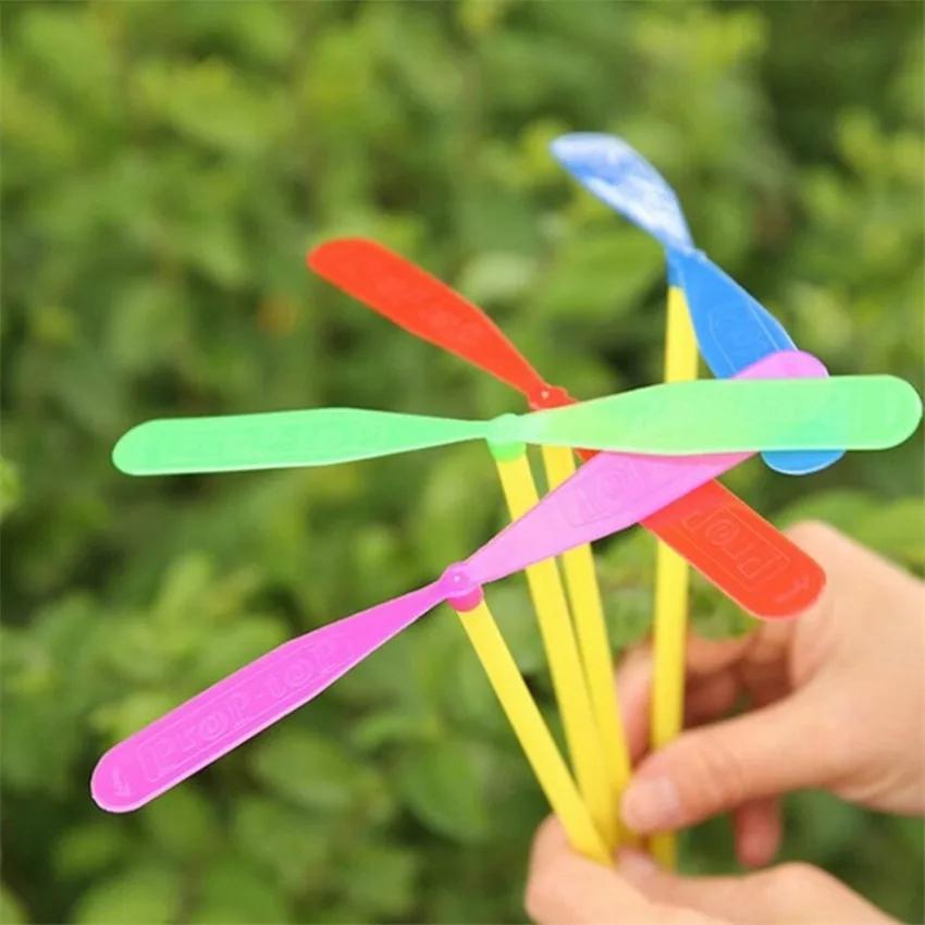 96Pcs Plastic Bamboo Dragonfly Shape Hand Push Flying Propeller Outdoor Sports Game Kids Toy Gift Rotating Flying Arrow Games