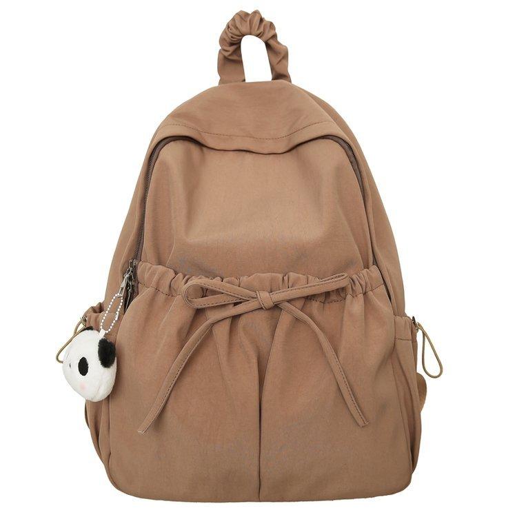 

Корейская версия рюкзака для старшеклассниц Ins, простой, большой вместимости, нишевый, литературный, для кампуса, дорожный рюкзак Small with pendant коричневый