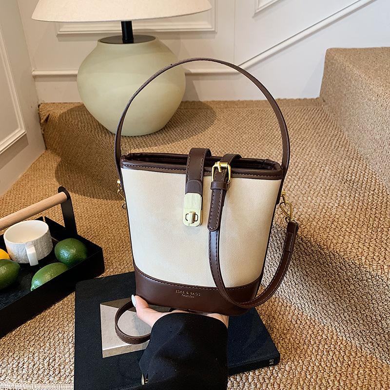 Retro casual texture contrasting color bucket bag 2025 autumn and winter new fashionable versatile simple portable shoulder messenger bag