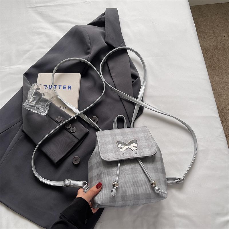 

Plaid backpack female fashion niche student class schoolbag bucket bag high value travel small backpack