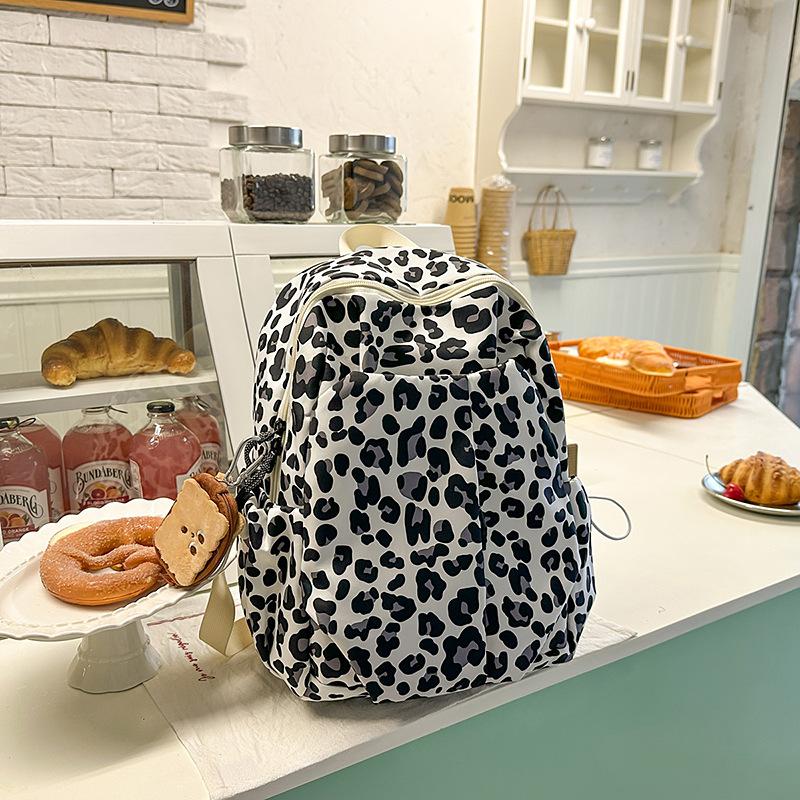 Casual printed backpack simple high value junior high school large capacity schoolbag student bag foreign style versatile shoulder back