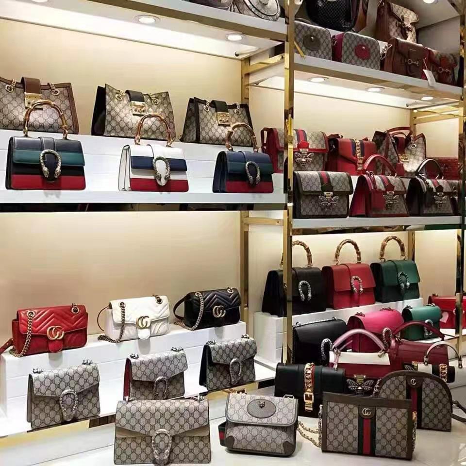 Ophidia Monogram Leather Mini Crescent Shoulder Bag