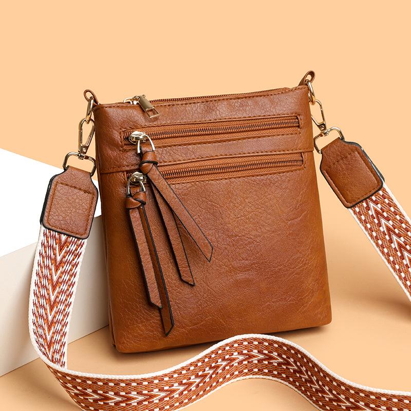 Vertikale Umhänge-Crossbody-Tasche mit mehreren Fächern und breitem Riemen