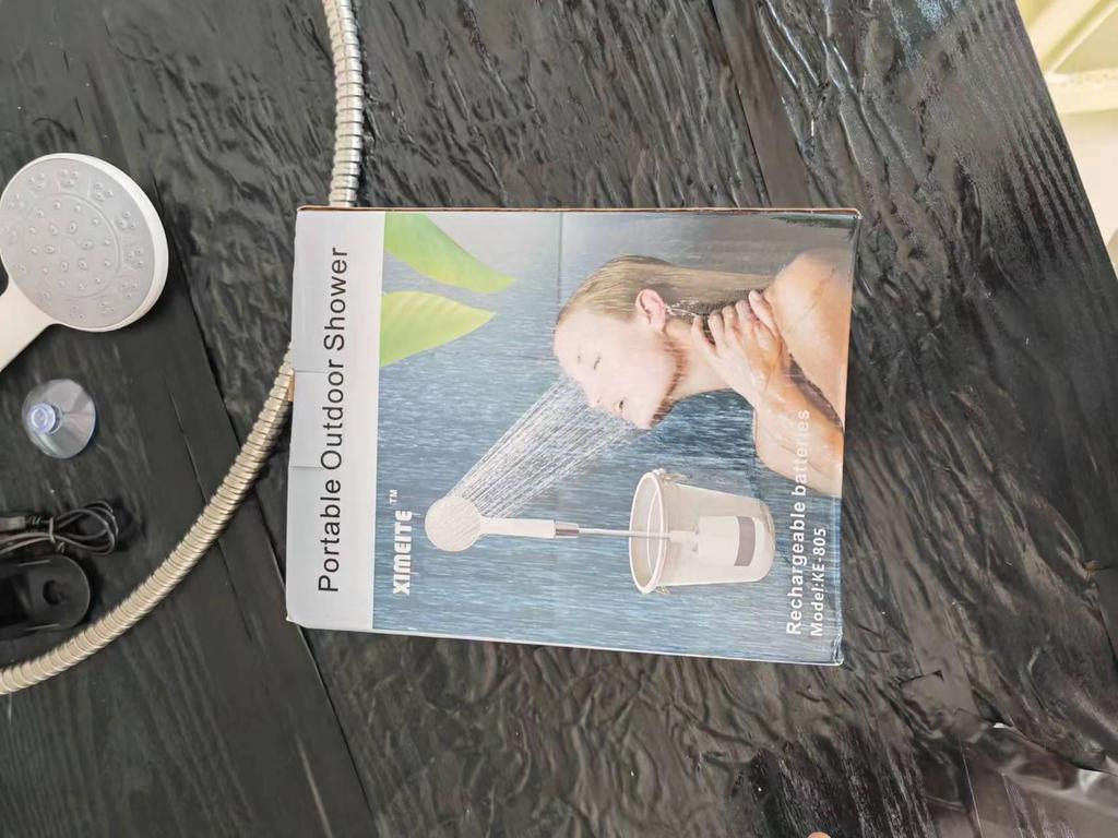 Portable Electric USB Charging Shower Head for Home, Dorm, and Outdoor Use