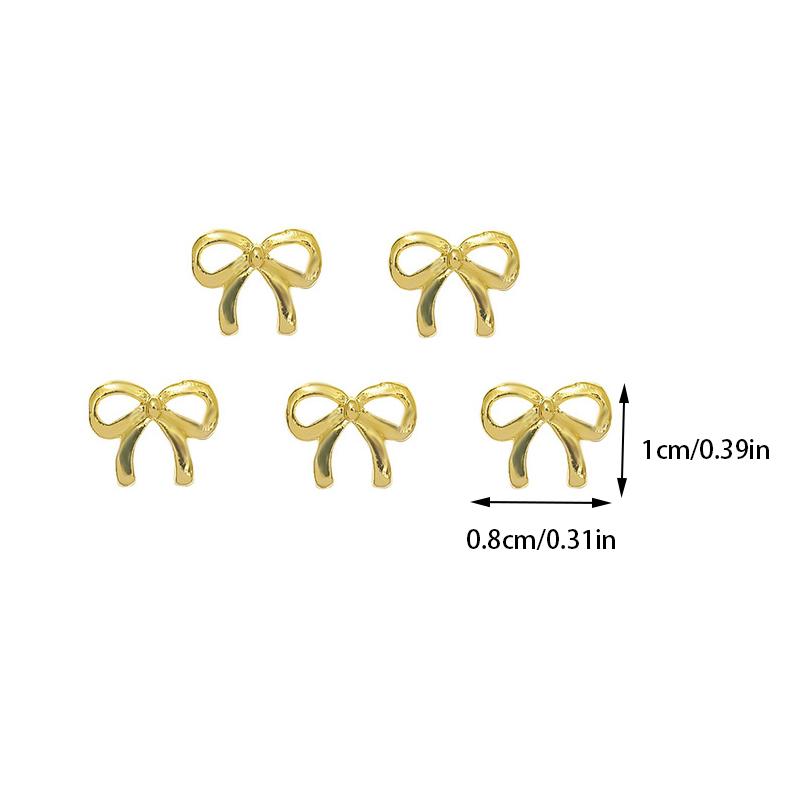 5 Stuks/Zak Elegante Legering Strik Nagel Charms 3D Metaal Zilver Goud Champagne Goud Licht Luxe Holle Strik Super Fee Nagellak Accessoire