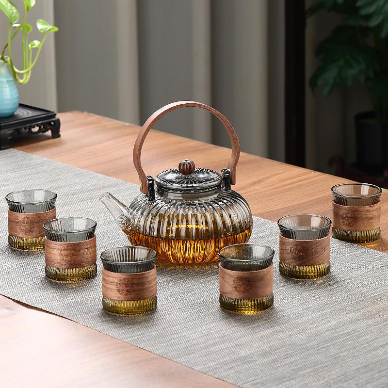 Pumpkin-Shaped High-Temperature Resistant Glass Teapot with Handle for Stove and Electric Ceramic Stove Heating.