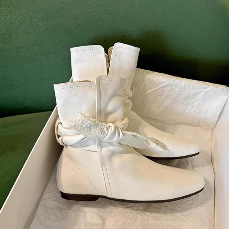 Модные зимние женские кожаные ботильоны на низком каблуке — фото 8