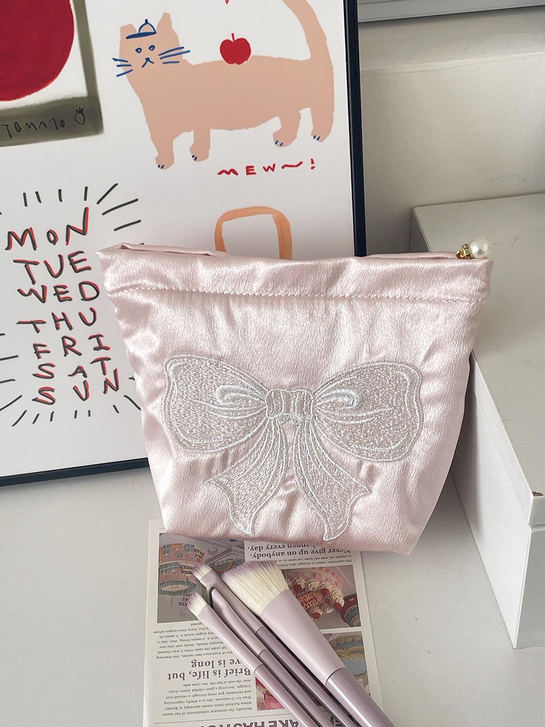 Cross-border pink pearlescent bow cosmetic bag cute girl heart premium large-capacity embroidered satin storage bag