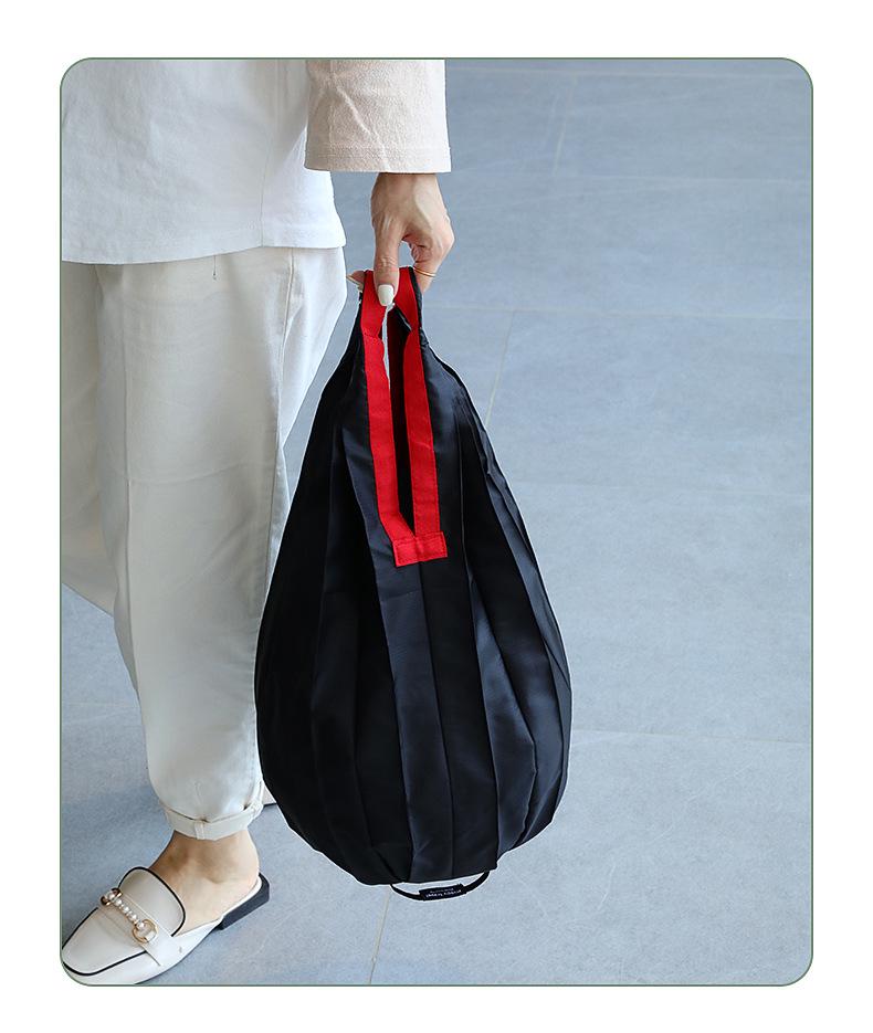 Eco-Friendly Foldable Shopping Bag: Large Capacity, Ultra-Light, Accordion Pleat Design with Hanging Buckle for Travel.