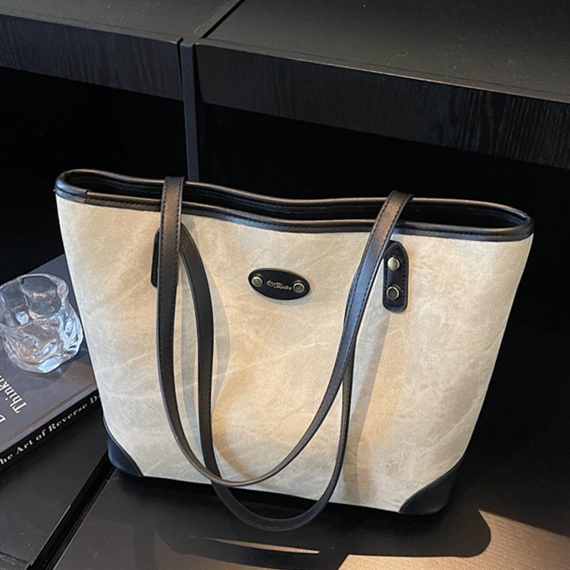 Large-capacity bag women's autumn and winter versatile 2025 new fashion casual shoulder bag texture class commuter bag