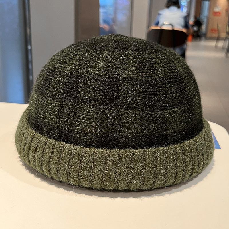 Europa und die Vereinigten Staaten heiß verkaufendes Karomuster Herbst und Winter Wollmütze Damen Krempe warm winddicht Strickmütze einfache Hauptmütze