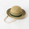 Spring and Summer New Children's Fashion Casual Hollow Hand-woven Dome Curled Edge Large Pearl Chain Straw Hat Outdoor Catwalk Hat