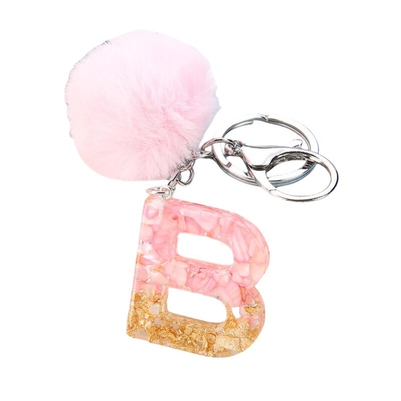 Modischer Schlüsselanhänger mit Plüschball und englischen Buchstaben Kreatives Autozubehör