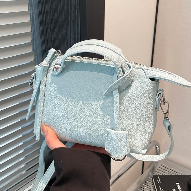 Fashion Korean personalized Spice Girl style portable pillow bag female casual foreign style simple style solid color messenger bag bag