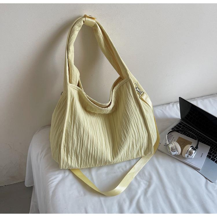 

2025 summer new bag wrinkled underarm bag tote bag Korean version large capacity shoulder commuter bag women s bag жёлтый