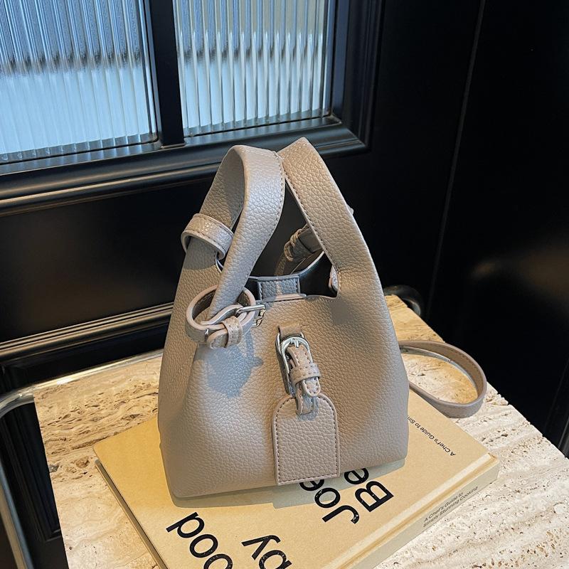Retro texture handbag women's spring and summer new children and mothers fashionable simple bucket bag solid color messenger bag