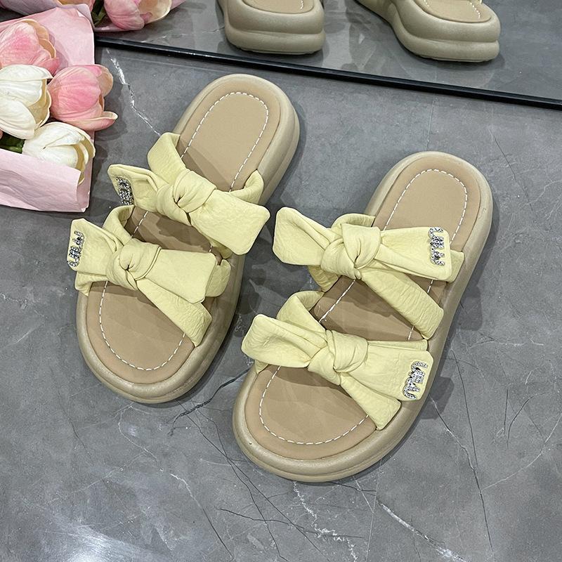 Flat-bottomed Bow Slippers for Women's Summer Wear 2025 New Seaside Beach Shoes with Skirts Lazy One-pedal Slippers