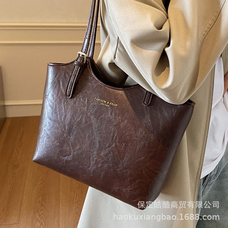 Premium sense large-capacity commuter bag women's fashion new class 2025 women's handheld satchel shoulder tote bag