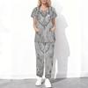 Women Plus Size Blue White Floral Printed Cutout Neck Short Sleeve Scrub Top With Pockets And Long Pants Set