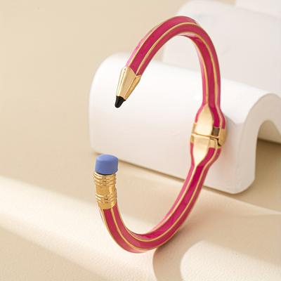 A Stylish Jewelry Piece Featuring a Three-Dimensional Pencil Design with a Spring Opening Perfect As a Gift