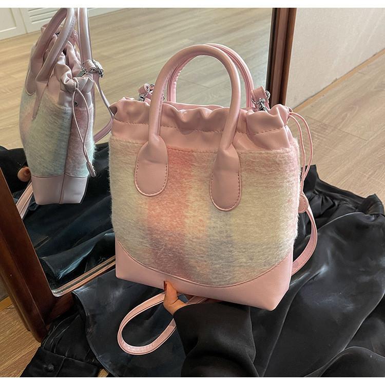 2023 Neue Koreanische Farbblock-Freizeit-Tasche Vintage-Mode Woll-Eimer-Tasche Grenzüberschreitender Trend-Stil