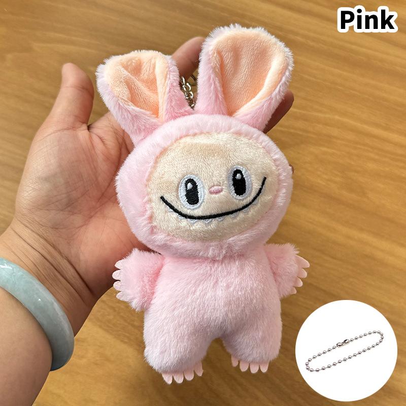 

Labubu The Monsters Blind Box Toys Cardiac Macarone Mysterious Surprise Box Guess Bag Figure Model Bag Keychain Gifts розовый