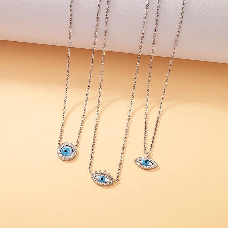 Elegant European Blue Gold-Plated Titanium Steel Eye Pendant Necklace for Women - Versatile Clavicle Chain Jewelry