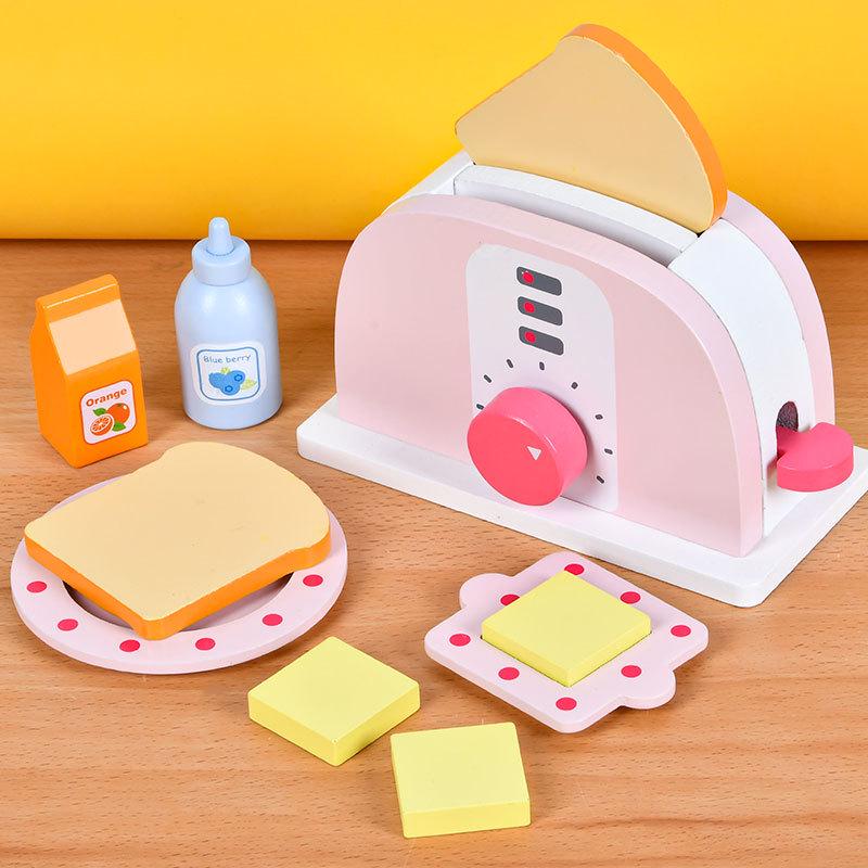 Pink Wooden Play Kitchen Appliances for Kids: Blender, Juicer, Coffee Maker, Toaster, Microwave.