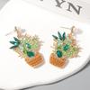 Personality, creative design, cartoon version, cute zircon imitation pearl green cactus earrings, earrings.