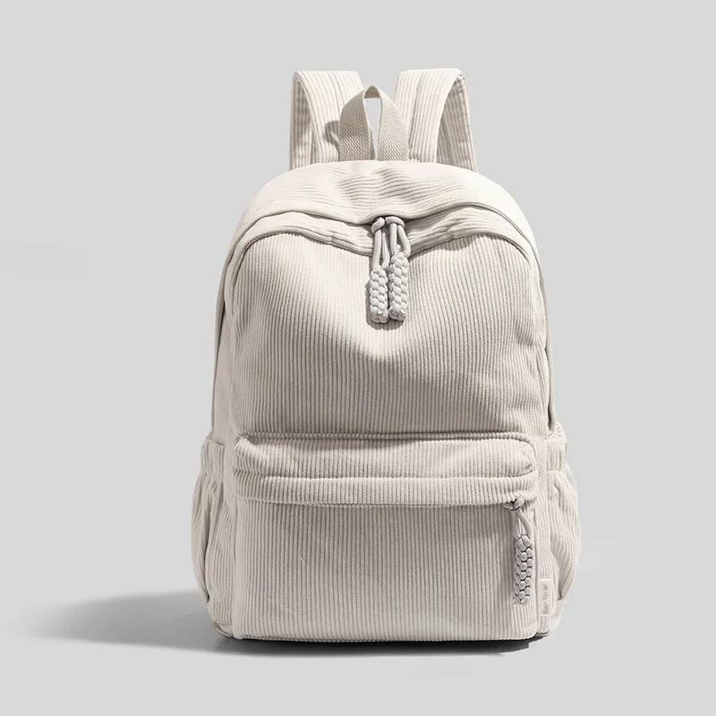 

New solid-color corduroy student backpack, casual striped velvet backpack, 14-inch women s computer storage bag